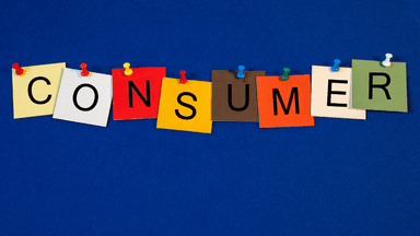 Colorful sticky notes spelling the word "CONSUMER" on a blue background