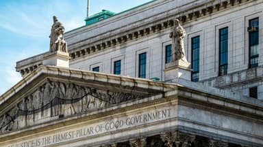 Federal Reserve Holds Interest Rates Steady, Signals Potential Cuts Amid Mixed Economic Signals